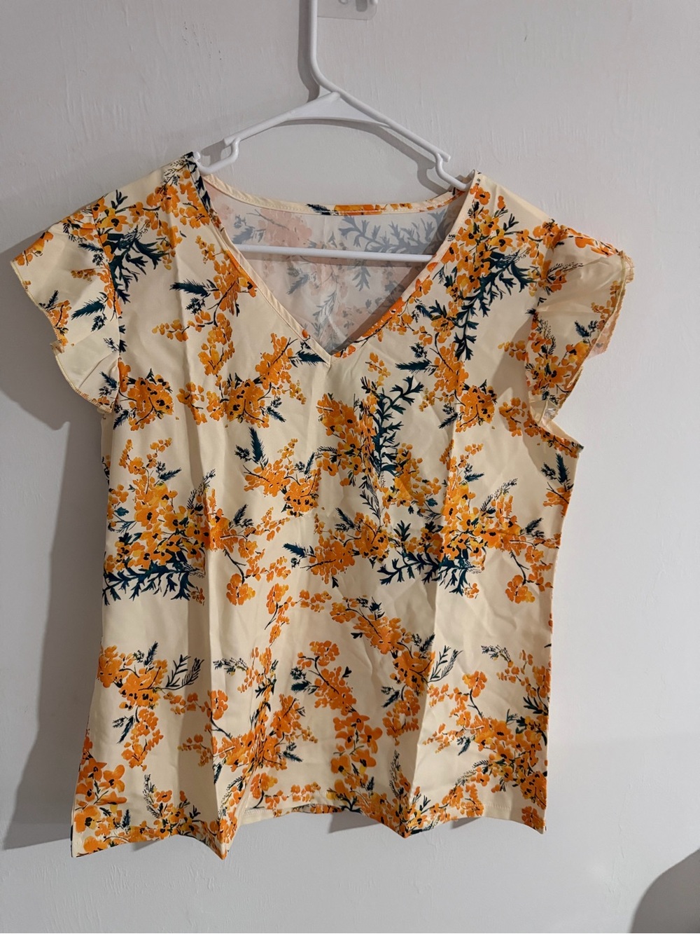 Women’s Cream Floral V-Neck Top with Orange Print